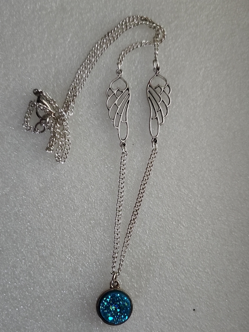 Hand Crafted Silver Wing Necklace with Blue Druzy Pendant